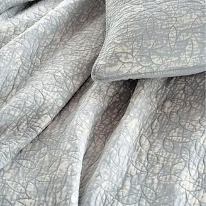 DKNY Sunwashed Reversible Twin Quilt in Grey. No pillows